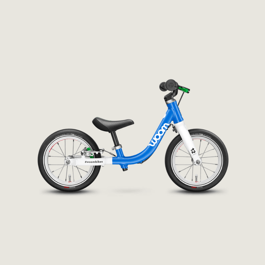 Woom Original 1 loopfiets - Blauw - Tiny Library